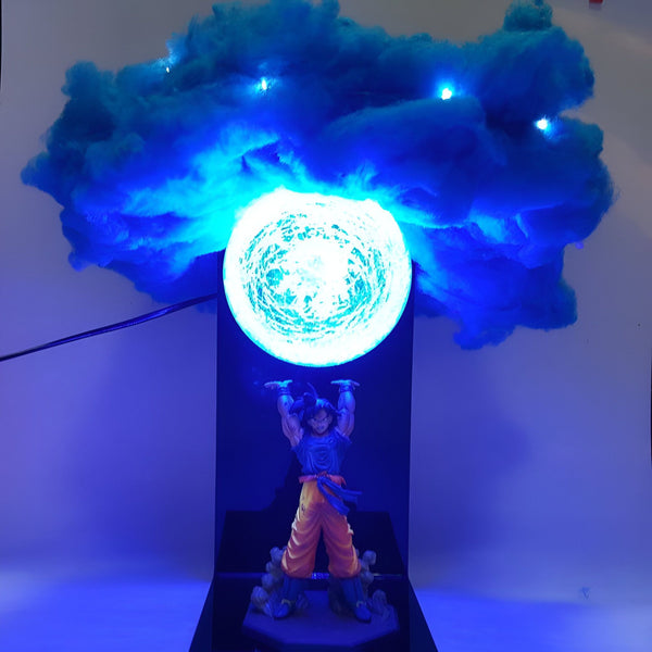 Une figurine de Son Goku, un personnage de Dragon Ball Z, est en train de charger un Genkidama. Le Genkidama est une boule d'énergie lumineuse.,LA-188714949X
