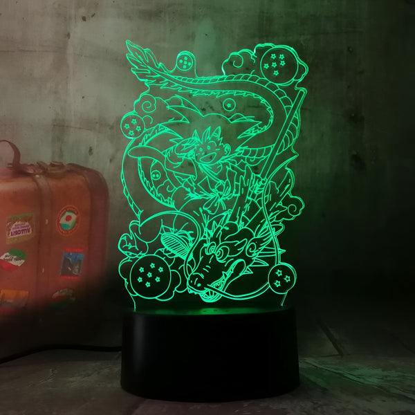 Une image d'une lampe 3D en forme de dragon vert. Le dragon est enroulé autour d'un socle noir et tient une boule de cristal dans sa gueule. La lampe est éclairée par une lumière verte.,LA-9210201272