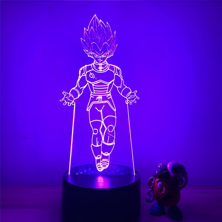 Une image d'un personnage de dessin animé, Vegeta, de la série Dragon Ball Z. Il est représenté en train de voler, avec ses cheveux bleus hérissés et sa combinaison de combat bleue et jaune. Il y a un petit personnage de Mr. Patate à côté de lui.,LA-3957209749