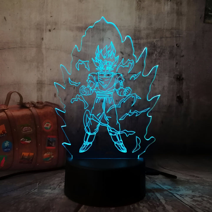 Une image d'une figurine de Son Goku, un personnage de la série animée Dragon Ball Z. Il est représenté en train de se téléporter, entouré d'un halo de lumière bleue.,LA-791964187X