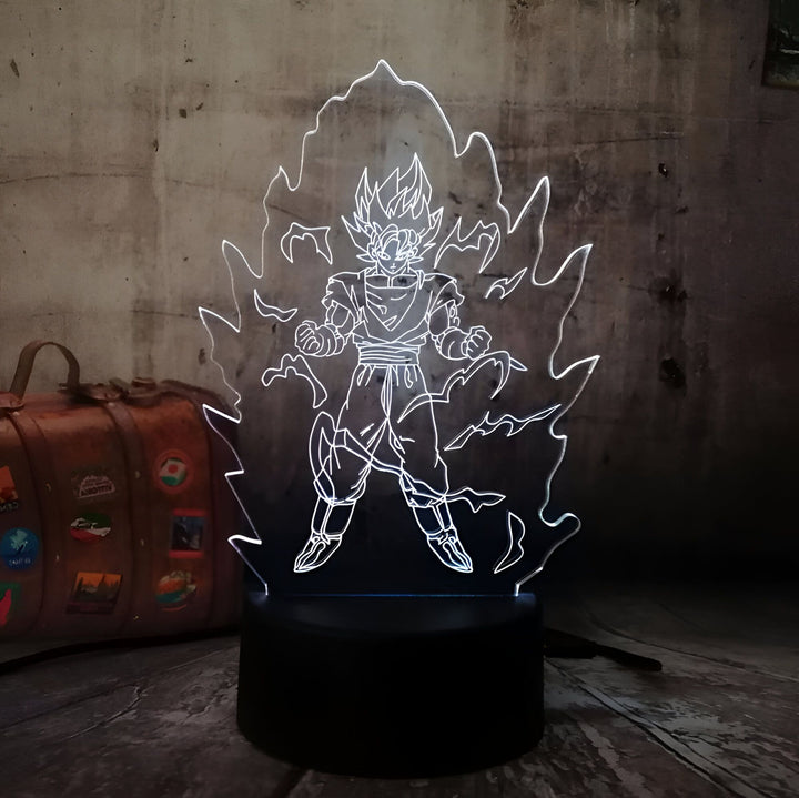 Une lampe en acrylique représentant Son Goku, un personnage de la série animée Dragon Ball Z. Il est représenté en train de se téléporter, entouré d'un halo de lumière.,LA-791964187X