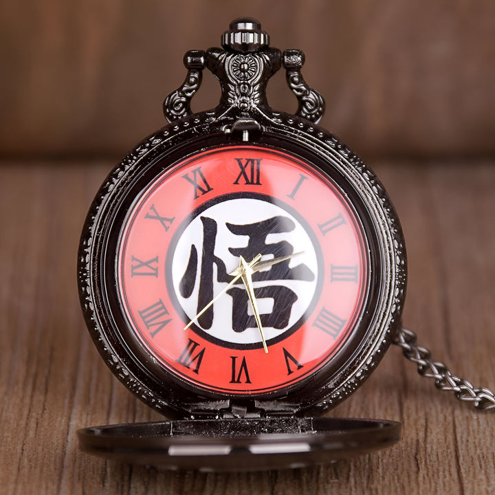 Une montre de poche en métal noir avec un cadran rouge et des chiffres romains. Le logo de Dragon Ball Z est imprimé sur le cadran.,MO-5657086066