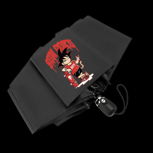 Un parapluie noir avec un imprimé de Son Goku, un personnage de Dragon Ball Z. Il porte un skateboard et un t-shirt rouge avec le logo "Goku".,PA-9867627199