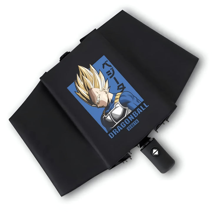 L'image représente un parapluie noir avec une image de Vegeta, un personnage de la série animée Dragon Ball Z. Le parapluie est ouvert et on peut voir le visage de Vegeta sur le dessus. Le parapluie est également doté d'une poignée noire.,PA-7858760777