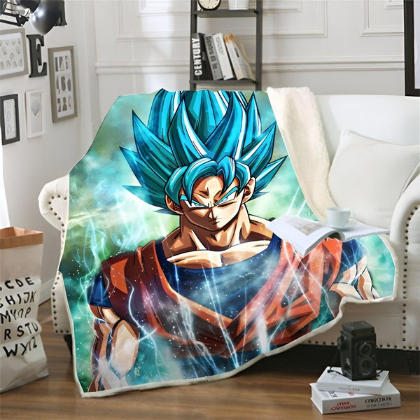 Une couverture en polaire avec Son Goku, un personnage de Dragon Ball Z. Il est représenté avec les cheveux bleus et l'air déterminé. Il porte sa combinaison orange et bleue.,PL-822801452X,PL-8085801620