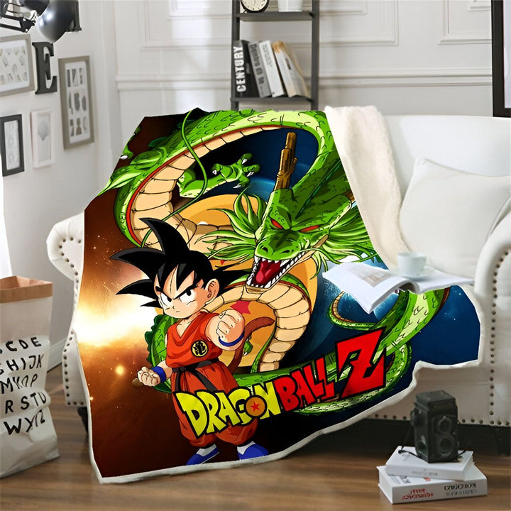 Une couverture en polaire avec un motif de Dragon Ball Z. Sur la couverture, on peut voir Goku, le personnage principal de la série, en train de se battre contre un dragon. La couverture est verte et orange, et elle est très douce au toucher.,PL-3653265819,PL-0210002700