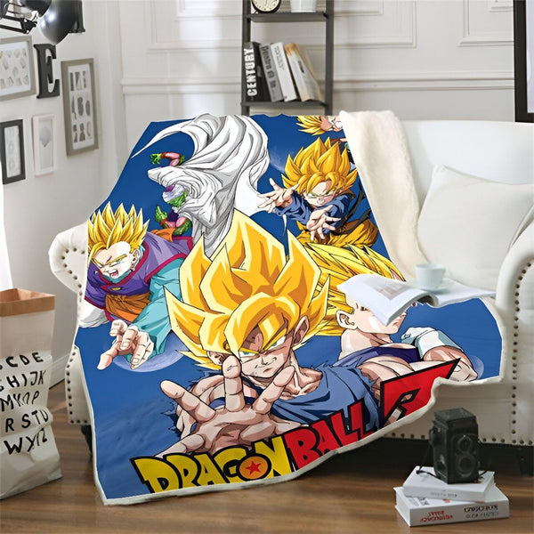 Une couverture en polaire avec les personnages de Dragon Ball Z. On y voit Goku, Vegeta, Gohan et Trunks.,PL-9115345408,PL-7556061183