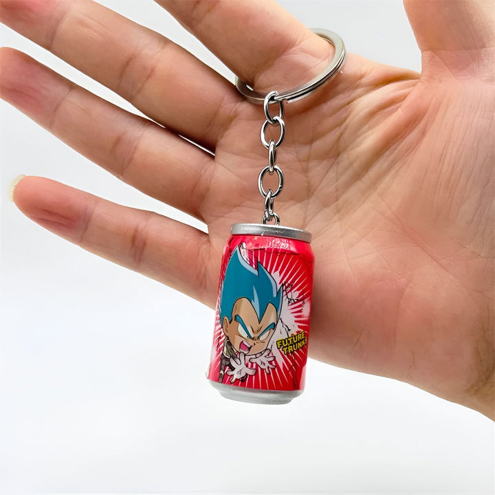 Un porte-clés en forme de canette de soda rouge avec un personnage de dessin animé dessus.,PO-1124743014