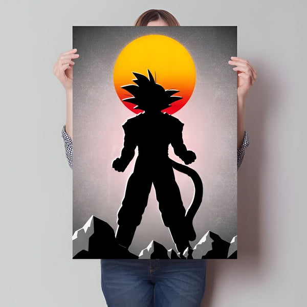 L'image représente un poster de Son Goku, un personnage de la série animée Dragon Ball Z. Il est représenté de dos, en silhouette, avec les cheveux hérissés et la queue de singe. Le soleil se couche derrière lui et les montagnes se dressent au loin.,PO-8894425088