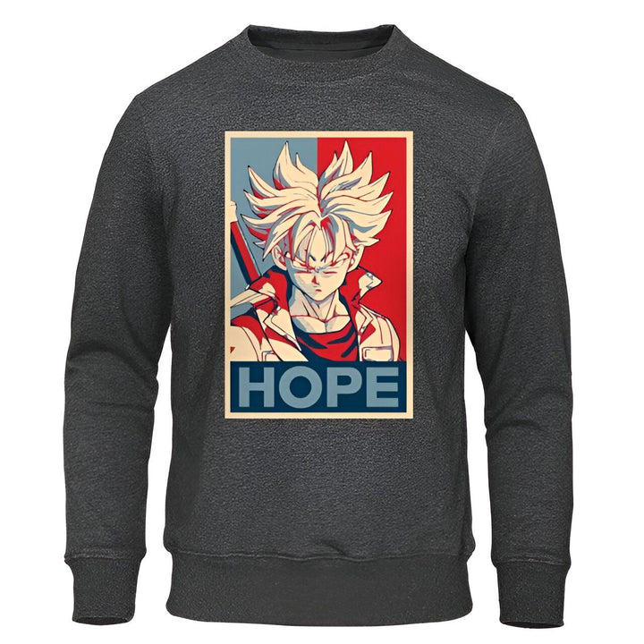 Le sweat-shirt gris présente un imprimé de Trunks du futur, un personnage de Dragon Ball Z. Il est représenté de face, avec ses cheveux blonds hérissés et sa combinaison bleue. Le texte "Hope" (espoir) est écrit en anglais sous l'image.