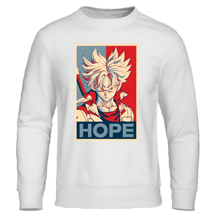 Le sweat-shirt blanc affiche l'image de Trunks du futur, un personnage de Dragon Ball Z. Il est représenté de face, avec les cheveux bleus et les yeux bleus. Il porte une veste bleue et une épée. Le texte "Hope" est écrit en rouge et bleu sous l'image.