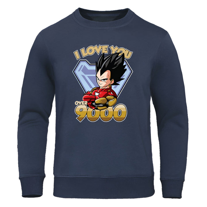 Le texte sur le sweat-shirt est "I love you over 9000". C'est une référence à la série animée Dragon Ball Z, dans laquelle le personnage Vegeta dit "Je suis le prince des Saiyans, Vegeta. Mon niveau de puissance est de plus de 9000 !".