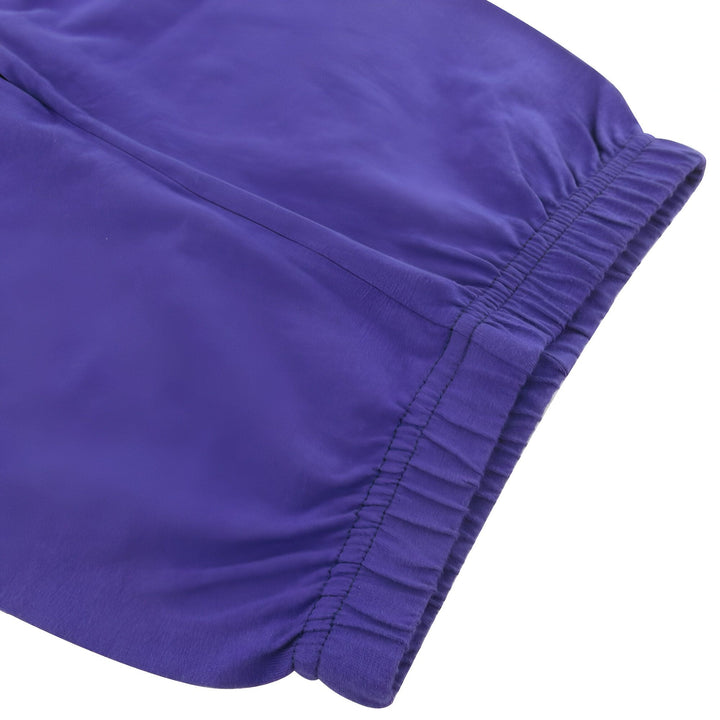 Le bas d'un pantalon de jogging violet pour enfant.,PY-9243760491,PY-6733673142,PY-2043356461,PY-1472505239,PY-157408044X