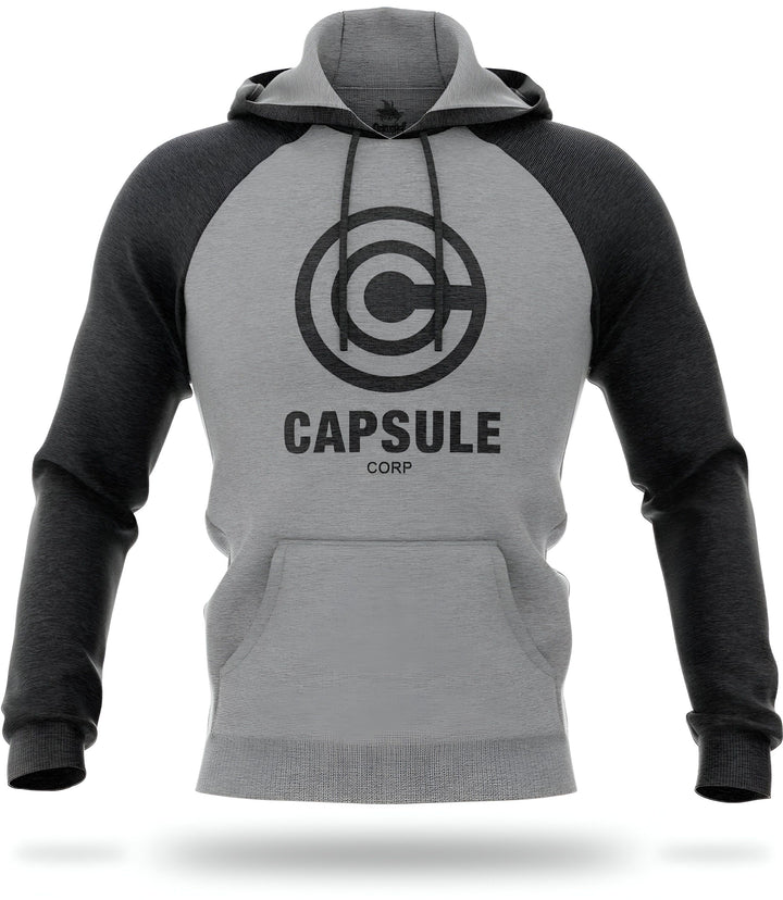 Un sweat-shirt gris à capuche avec le logo Capsule Corp en noir.,SW-9797419487,SW-617936656X,SW-4617205446,SW-3106072369,SW-7012958677,SW-734755019X,SW-1727709462,SW-1185247459,SW-014243535X,SW-8850456549,SW-1680545167,SW-5830771004,SW-0923995692,SW-8767134394,SW-5158723818