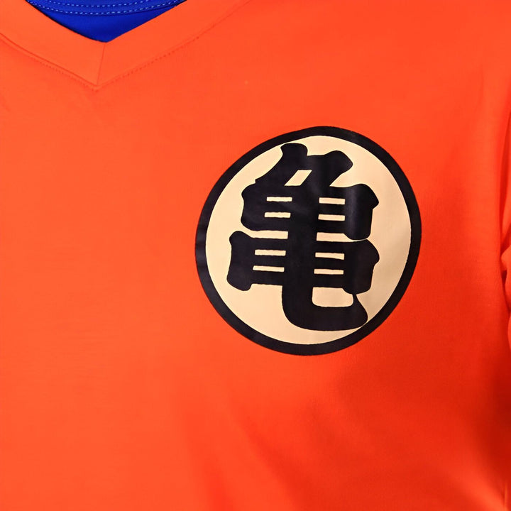 Le symbole de Tortue Géniale sur un t-shirt orange.,T--9291393177,T--9915238908,T--4610374072,T--2873889462,T--1715994981