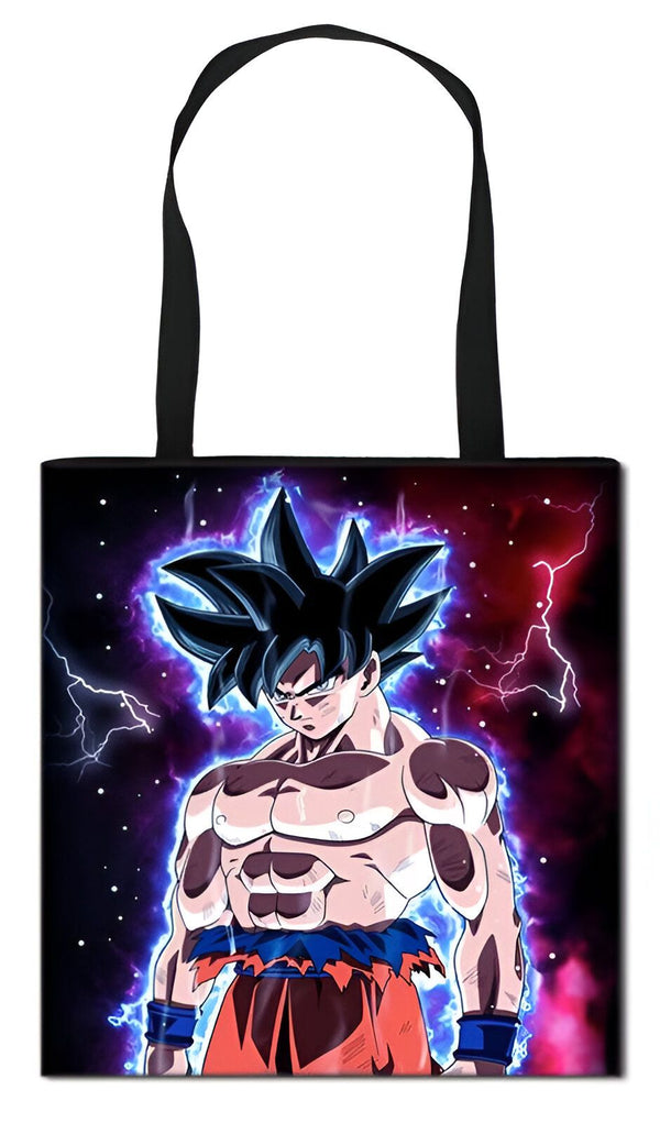 Le tote bag représente Son Goku, un personnage de la série animée Dragon Ball Z. Il est debout, les poings serrés, prêt à se battre. Il est entouré d'éclairs bleus et rouges.,TO-5637302626