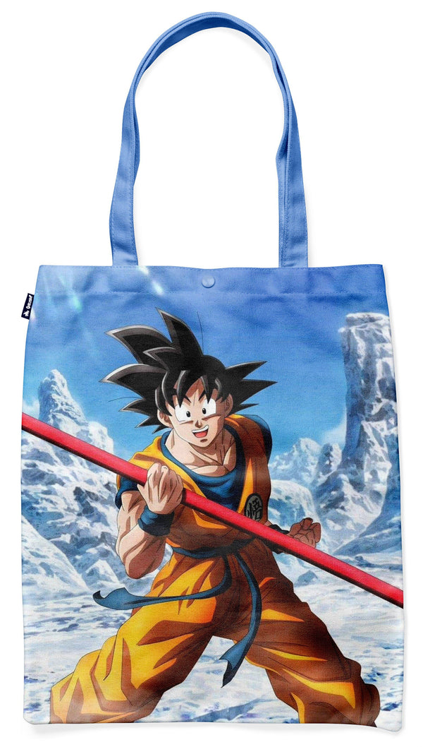 Le visuel représente un sac fourre-tout en toile de couleur bleu clair. Sur le devant du sac, on peut voir une image de Son Goku, un personnage de la série animée Dragon Ball Z. Son Goku est représenté en train de se battre, avec un bâton à la main. Le sac est doté de deux anses de couleur bleu foncé.,TO-6764198217