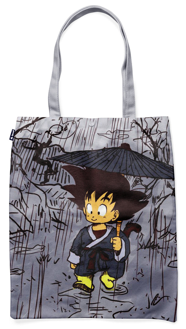 Le tote bag présente un dessin de Son Goku, un personnage de la série animée Dragon Ball Z. Il est vêtu d'un kimono et porte un parapluie. Le fond est gris et l'image est entourée d'un cadre noir.,TO-1103344463
