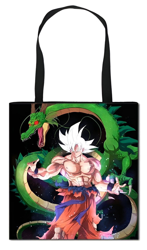 Le tote bag représente Son Goku, un personnage de la série animée Dragon Ball Z. Il est debout, les cheveux blancs hérissés, et porte une combinaison orange et bleue déchirée. Il est entouré d'un dragon vert.,TO-3997287236