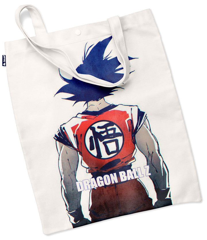Un tote bag en toile de couleur beige avec une illustration de Son Goku, un personnage de la série animée Dragon Ball Z. Son Goku est représenté de dos, avec ses cheveux bleus hérissés et sa combinaison orange et bleue. Le texte "Dragon Ball Z" est écrit en lettres bleues sur le bas du tote bag.,TO-2958377229