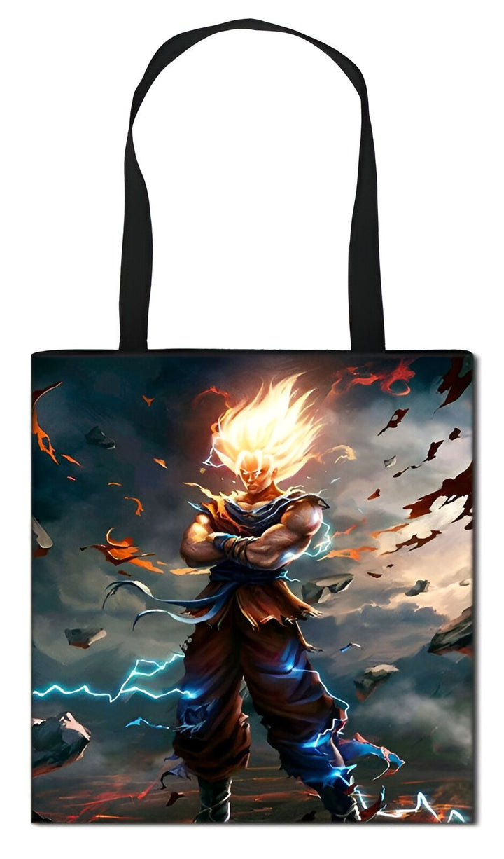 Le tote bag représente Son Goku, un personnage de la série animée Dragon Ball Z. Il est debout, les bras croisés, et porte sa tenue orange et bleue. Il est entouré d'éclairs et de rochers.,TO-720031787X